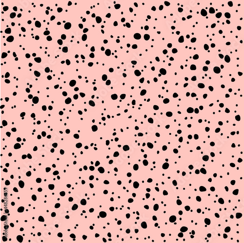 Seamless pink pattern with black dots