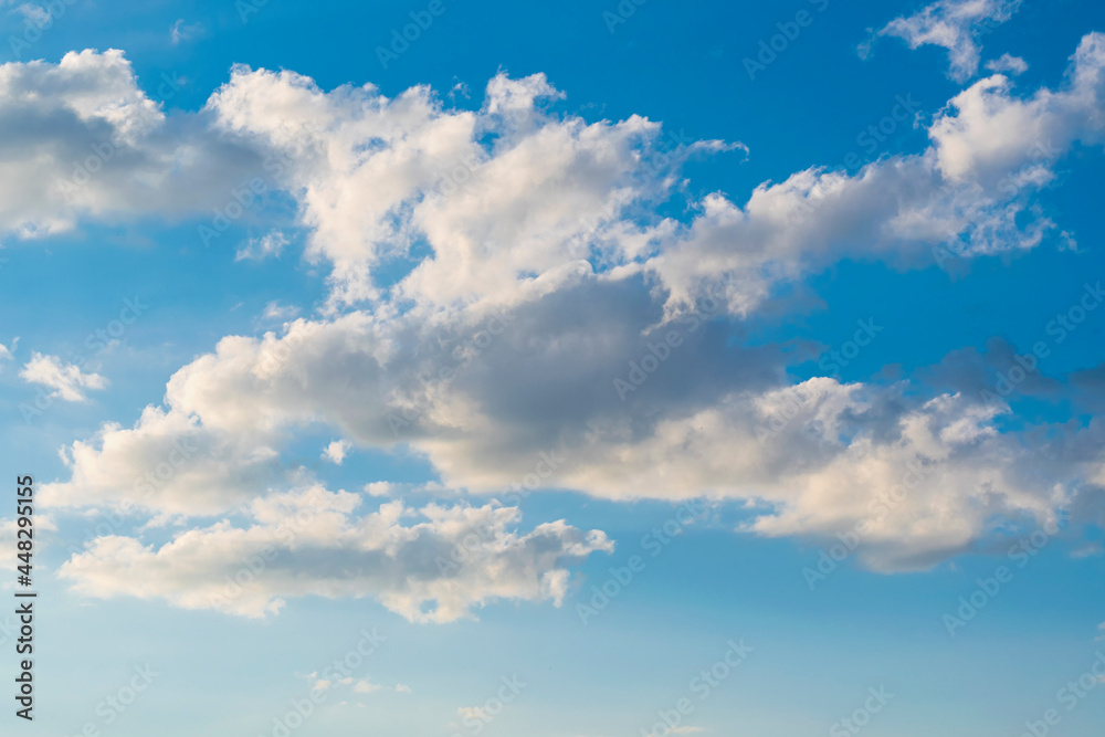 White heavy cloud against blue summer sky White heavy cloud against blue summer sky