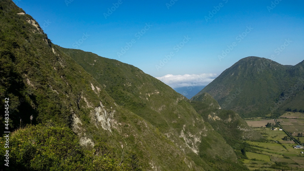Vegetation, mountains and clear skies