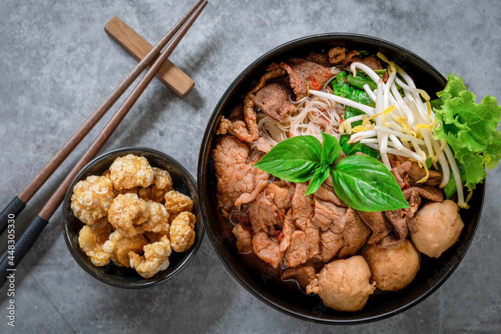 Pork Meatball Noodles with Thai Soup Thai people call it condensed boat noodles. Thai food concept. Pork Meatball Noodles with Thai Soup Thai people call it condensed boat noodles. Thai food concept.