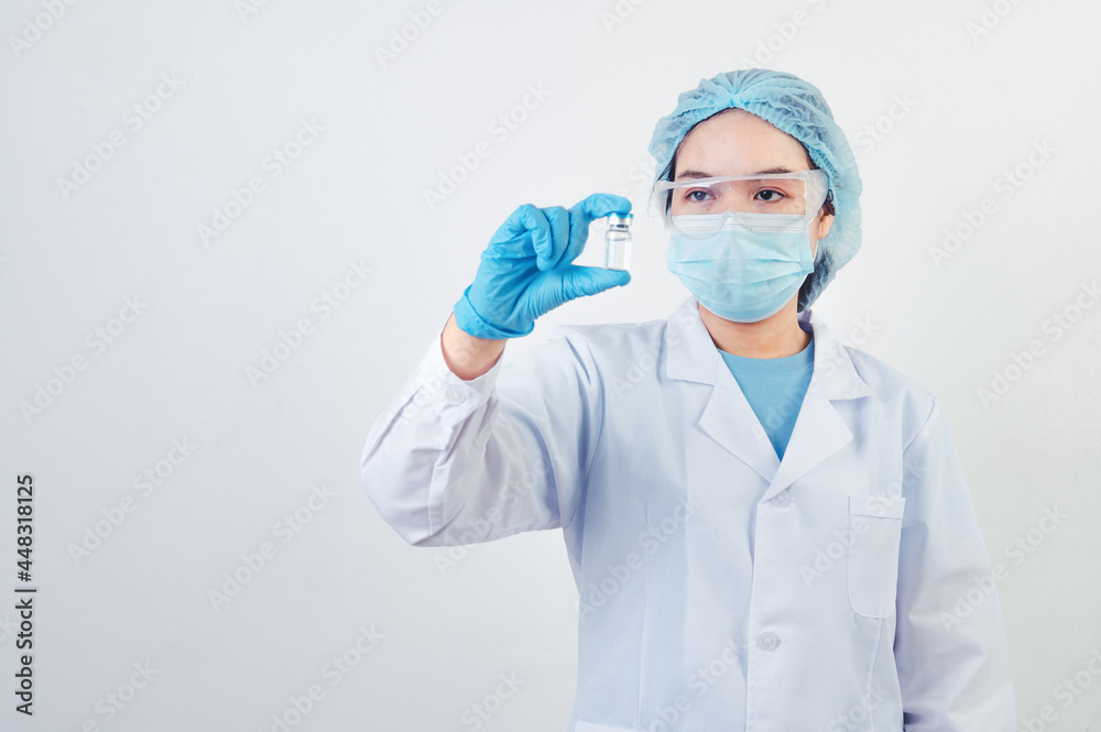 Professional scientist or doctor holding Covid-19 vaccine vial in hand of at laboratory for treatment with mask gloves and lab coat on white background. Health business and industry concept.