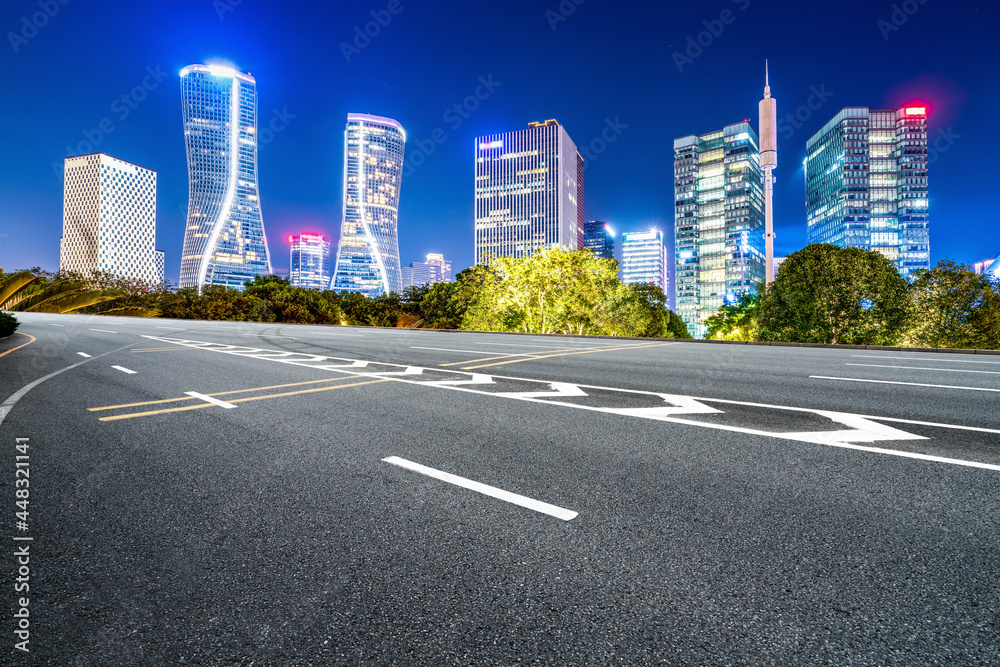 Fototapeta premium Skyline of Expressway Pavement and Night Scenery of Modern Architectural Landscape