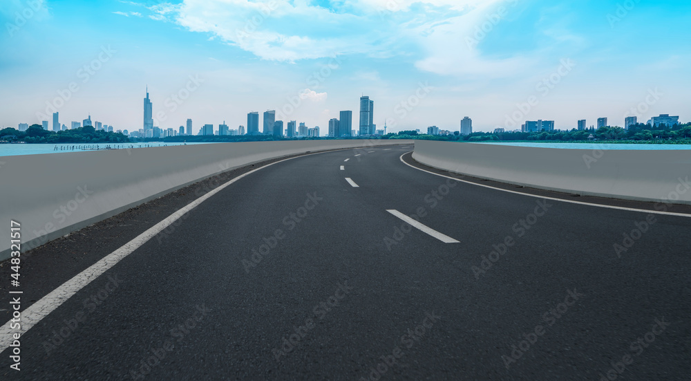 Fototapeta premium Asphalt Pavement Skyline and Nanjing Architectural Landscape