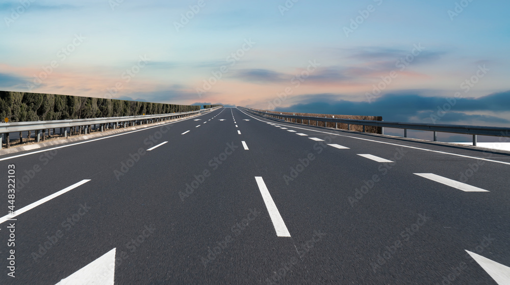 Fototapeta premium Skyline of Asphalt Pavement and Blue Sky and White Cloud