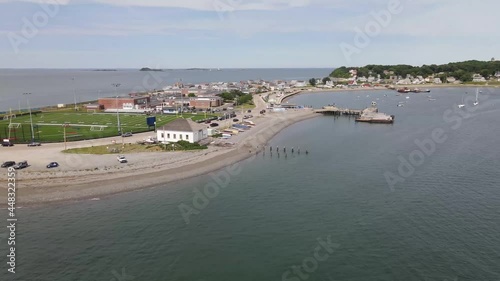 Drone approaching the Hull Gut parking area and beach in Hull, MA. Aerial slow pan left to right photo