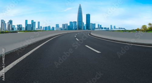 Road and skyline of urban architecture..