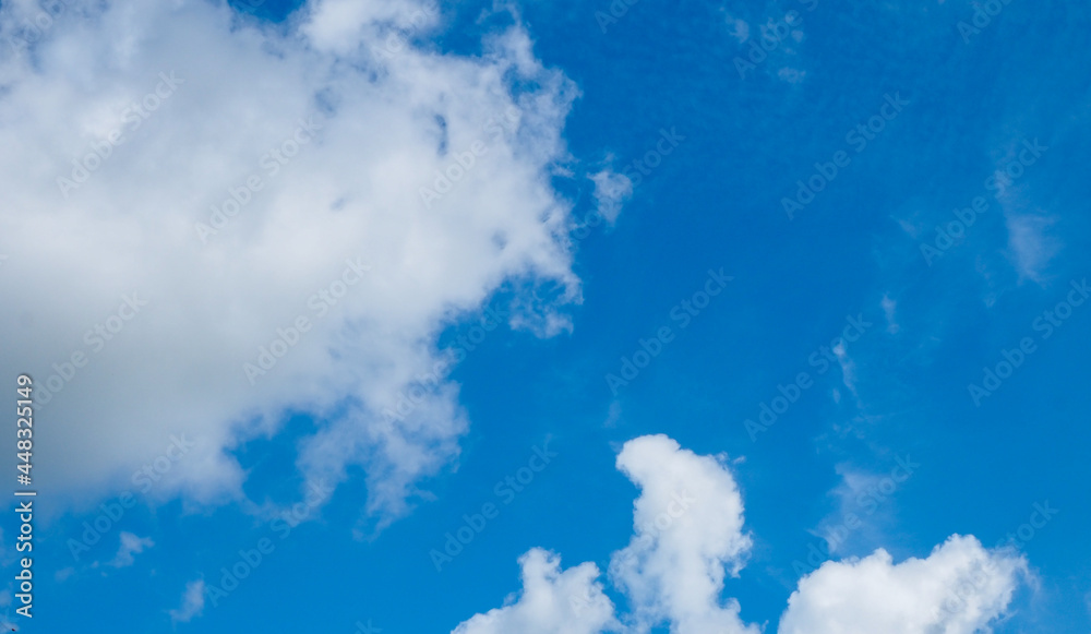 Blue sky and white clouds on a bright day Blue sky and white clouds on a bright day