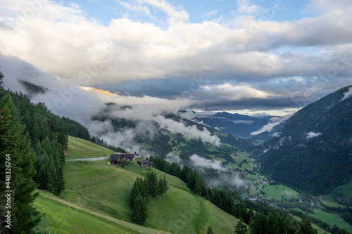 Fog moves up from the valley in the Alps. Austria