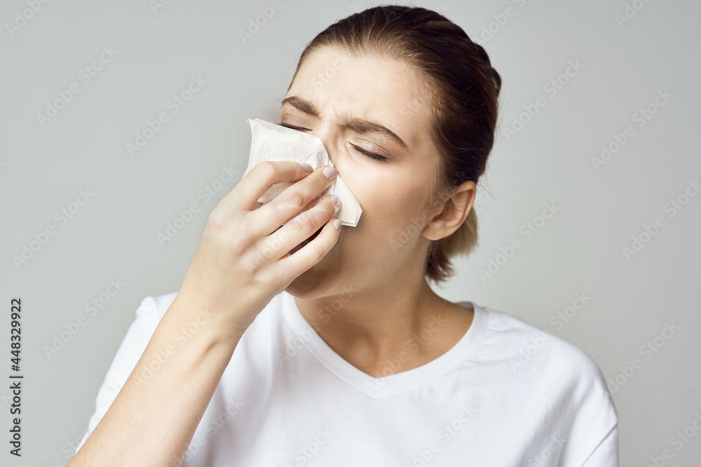 woman in white t-shirt handkerchief cold health problems woman in white t-shirt handkerchief cold health problems