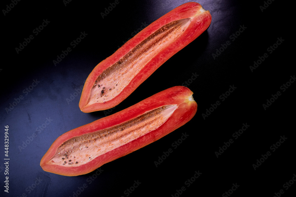 Ripe papaya isolated on black background Ripe papaya isolated on black background