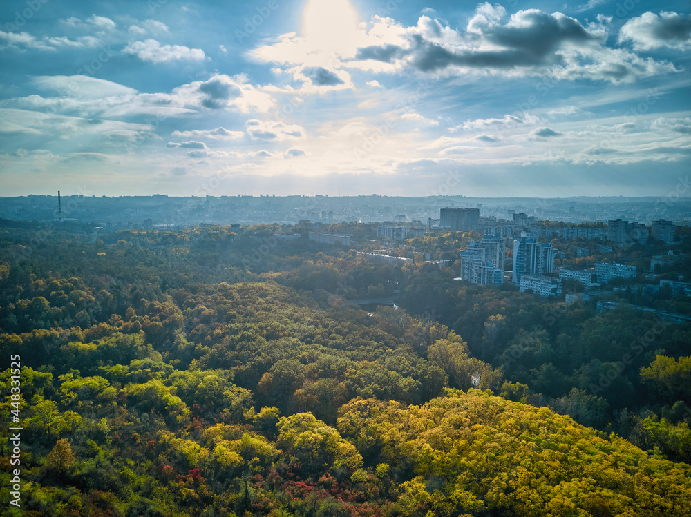 Aerial view of the city at sunset. Beautiful autumn city landscape