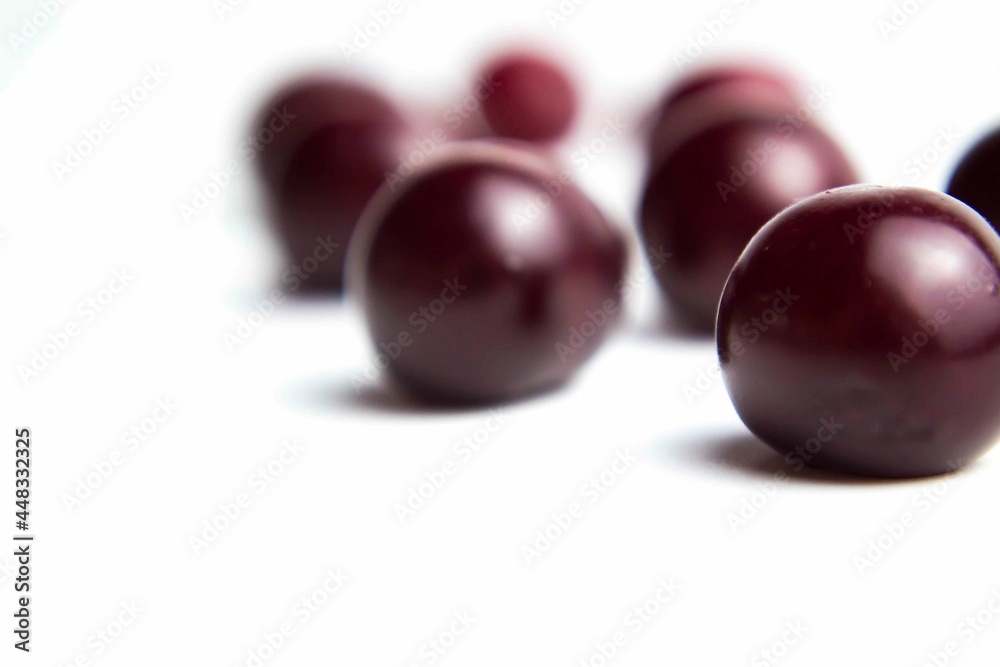 Ripe cherry on a white background. Place for the inscription in your article about the benefits of berries during beriberi. Ripe cherry on a white background. Place for the inscription in your article about the benefits of berries during beriberi.