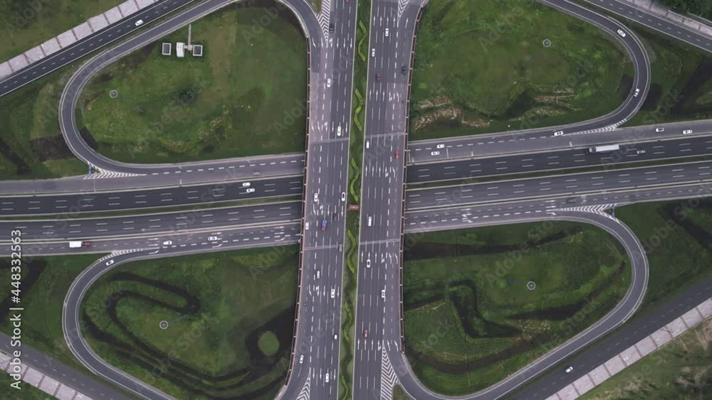 Top down angle aerial of modern multilevel traffic junction elevated