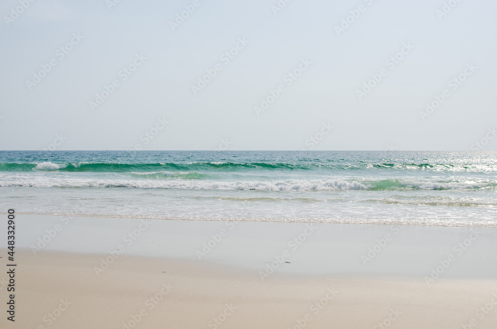 Beautiful turquoise waves on River No 2 Beach in Sierra Leone, West Africa