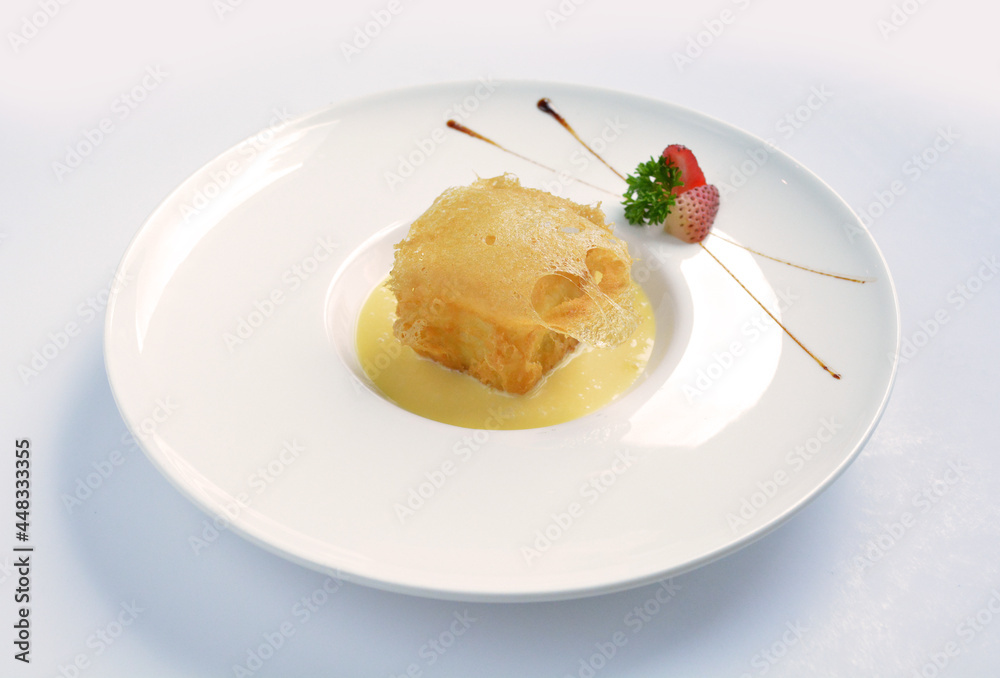 deep fried crispy golden premium durian dessert with yellow sauce in white background asian halal menu deep fried crispy golden premium durian dessert with yellow sauce in white background asian halal menu