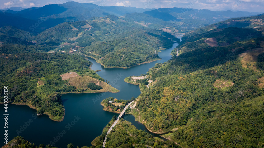 national reservoir or dam in the middle of the valley at chiang rai Thailand aerial view