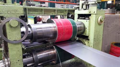 Rolled steel sheet coil slitting process in factory, slitting knife stand photo