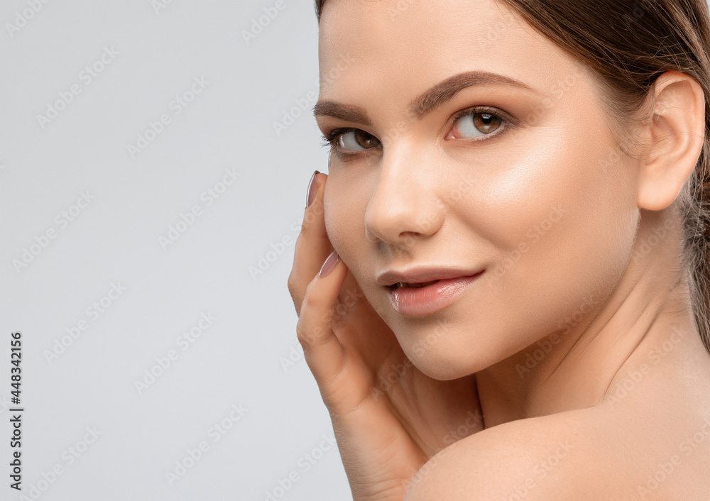 Portrait of attractive girl with healthy clean skin and beautiful make-up. Aesthetic cosmetology and makeup concept. Portrait of attractive girl with healthy clean skin and beautiful make-up. Aesthetic cosmetology and makeup concept.