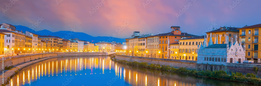 Citydscape with Pisa old town and Arno river in Italy