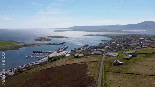 4k drone footage of the town of Stromness in the Orkney Islands, Scotland, UK photo