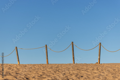 The fence on the sandy beach in Yyteri