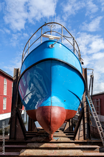 Slika na platnu fishing vessel in dockyard for maintenance