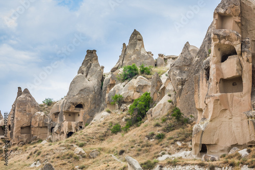 Amazing Volcanic rock formations known as Love Valley or Fairy Chimneys in Cappadocia, Turkey. Mushroom Valley one of attractions in Goreme National Park, Turkey. Mountains with rooms inside