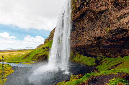 Seljalandsfoss waterfall - famous popular tourist destination in Iceland, part of the golden circle