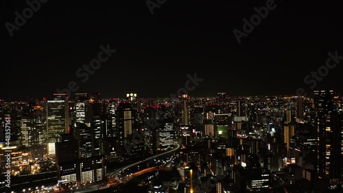Wallpaper Mural UMEDA, OSAKA, JAPAN : Aerial high angle view of CITYSCAPE of OSAKA at night. View of buildings and street around Osaka and Umeda station. Wide view real time shot. Torontodigital.ca