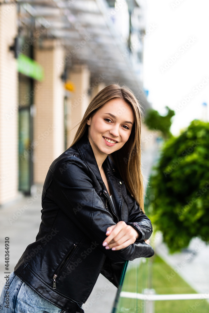 girl standing on the stone stairs and handrail at the street girl standing on the stone stairs and handrail at the street
