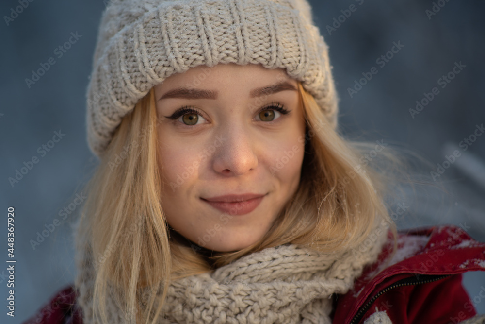 Beautiful girl in a frosty winter forest on a sunny day Beautiful girl in a frosty winter forest on a sunny day