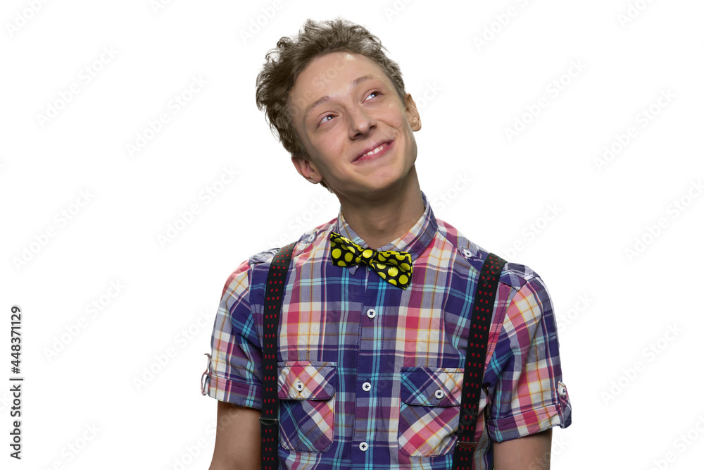 Handsome teenage boy is daydreaming about something good. Handsome teenage boy is daydreaming about something good.