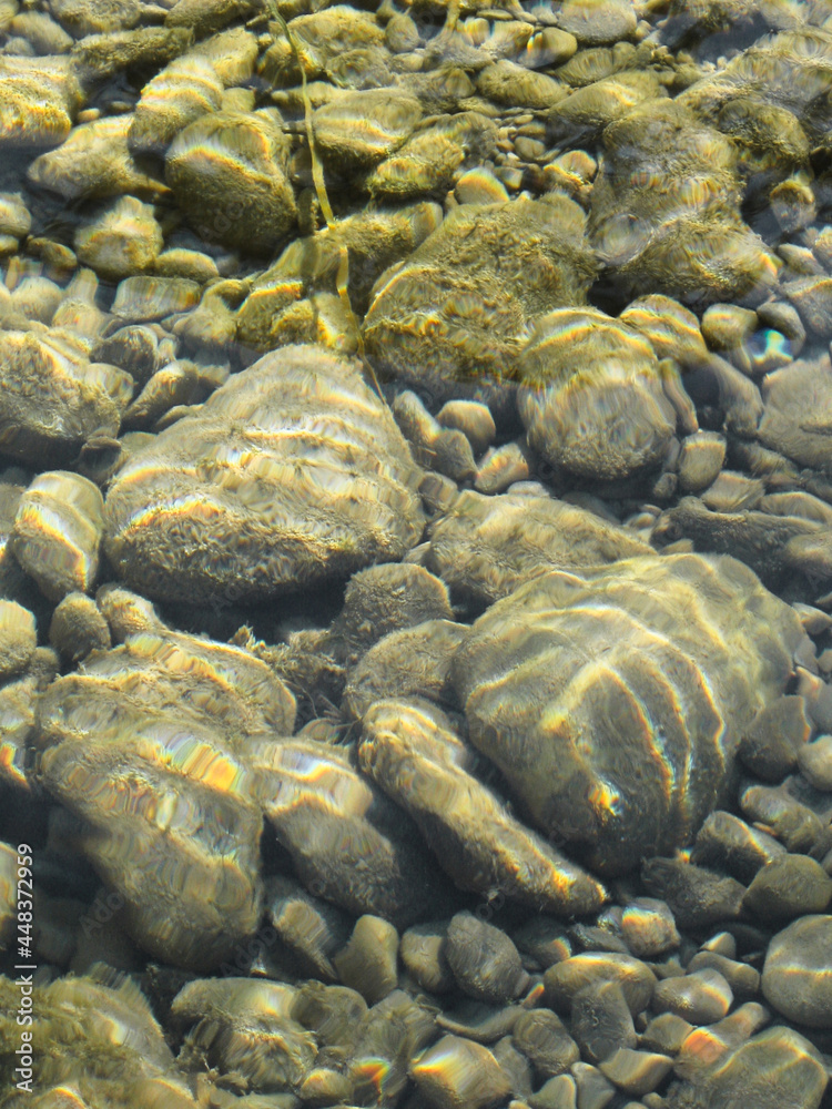 stones under water