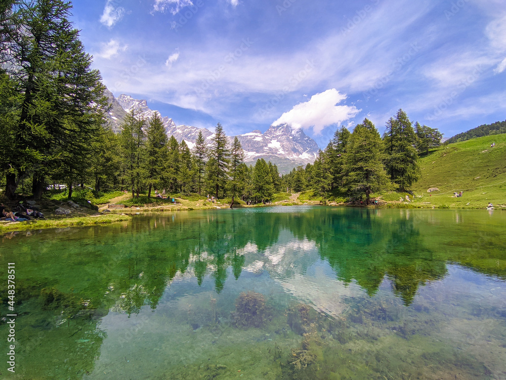 View of the scenic Blue Lake (Lago Blu) surrounded by a beautiful alpine landscape near Cervinia, Aosta Valley, Italy