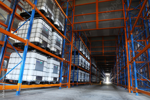 IBC Liquid Containers stacked in Warehouse photo