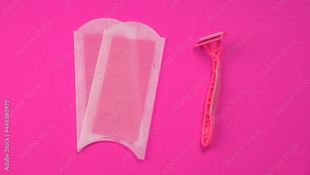 Set of different means for epilation on a colored background. Removal of unwanted hair. Modern epilator, wax strips, razor. Set of different means for epilation on a colored background. Removal of unwanted hair. Modern epilator, wax strips, razor.