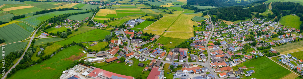 Aerial view of the village Wörleschwang in Germany, Bavaria on a sunny spring day in the afternoon..
