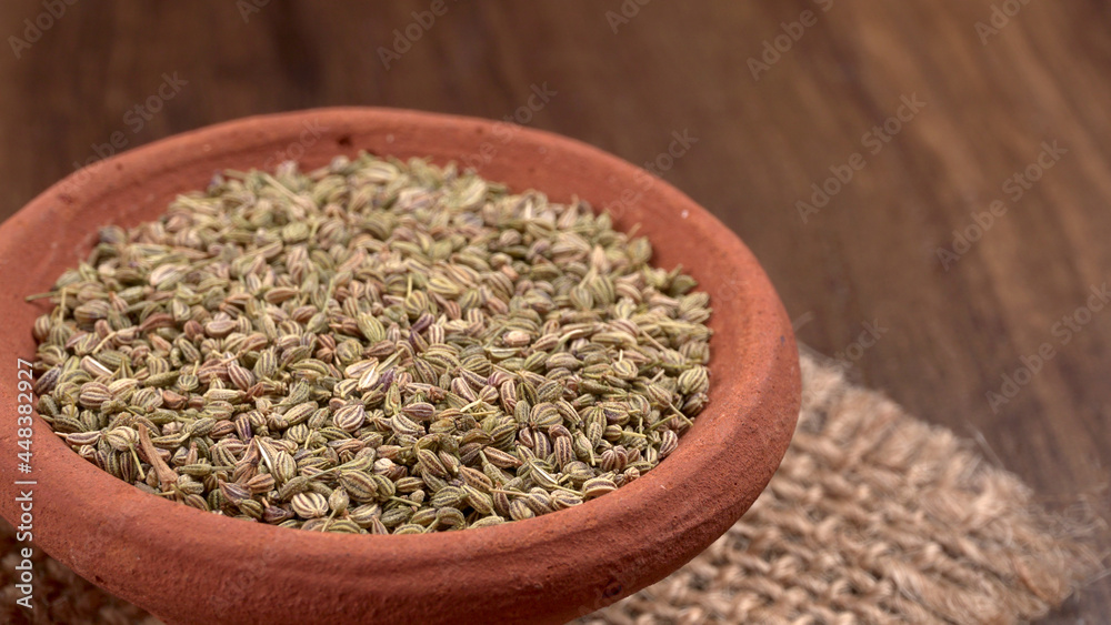Ajwain Also Know as Ajowan, Caraway or (Trachyspermum Ammi) in spoon and in bowl. Ajwain Also Know as Ajowan, Caraway or (Trachyspermum Ammi) in spoon and in bowl.