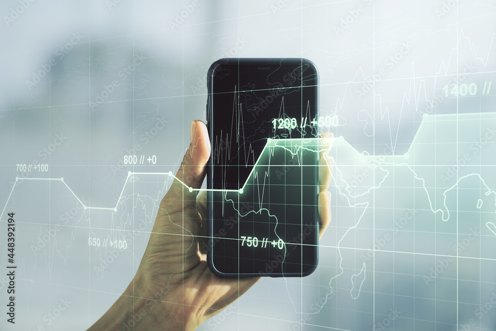 Multi exposure of abstract statistics data hologram interface and hand with cellphone on background, computing and analytics concept Multi exposure of abstract statistics data hologram interface and hand with cellphone on background, computing and analytics concept