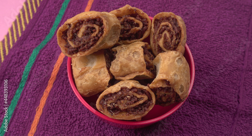 Indian traditional Snacks Bhakarvadi or Bakarvadi. Diwali snacks Bhakarwadi, selective focus.