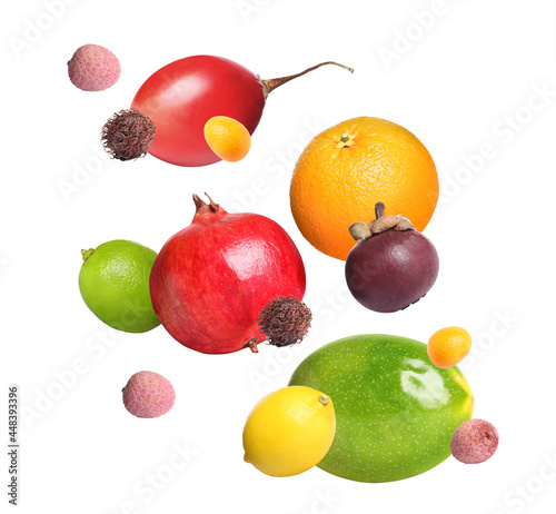 Fototapeta Naklejka Na Ścianę i Meble -  Different tasty exotic fruits flying on white background