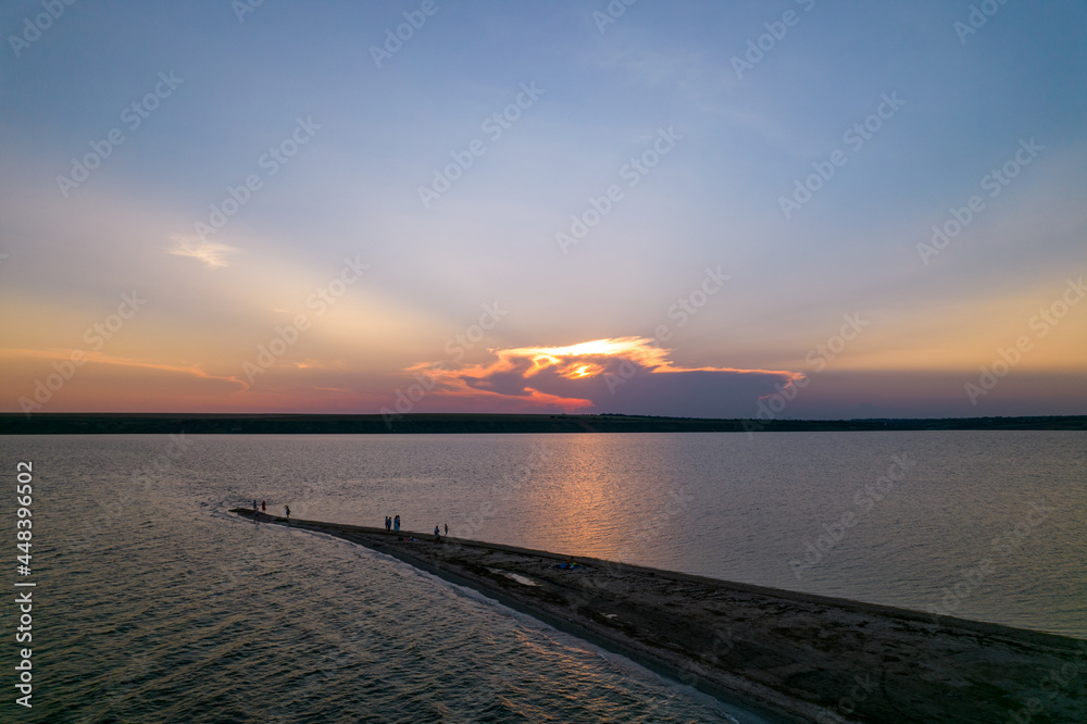 Obraz premium Aerial view of the sunset over the estuary