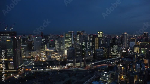 Wallpaper Mural UMEDA, OSAKA, JAPAN : Aerial high angle sunrise view of CITYSCAPE of OSAKA. View of buildings and street around Osaka and Umeda station. Wide view time lapse shot, night to morning. Torontodigital.ca