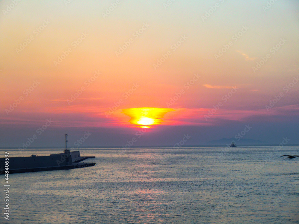 cruise ship arriving to Civitavecchia port at sundown, Lazio, Rome, Italy, Europe