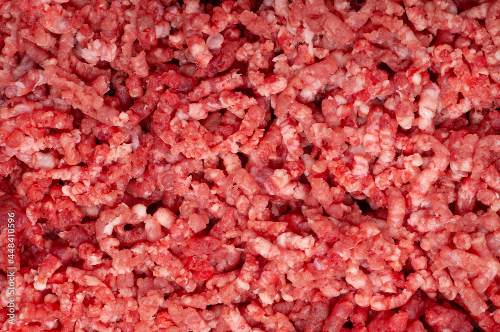 Background texture of of raw minced meat close up Background texture of of raw minced meat close up