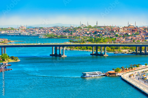 Istanbul city panorama with Halic Metro Bridge or Golden Gate Bridge photo