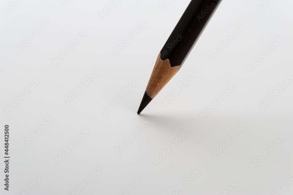 Black Pencil on a Light Background. Black Pencil on a Light Background.