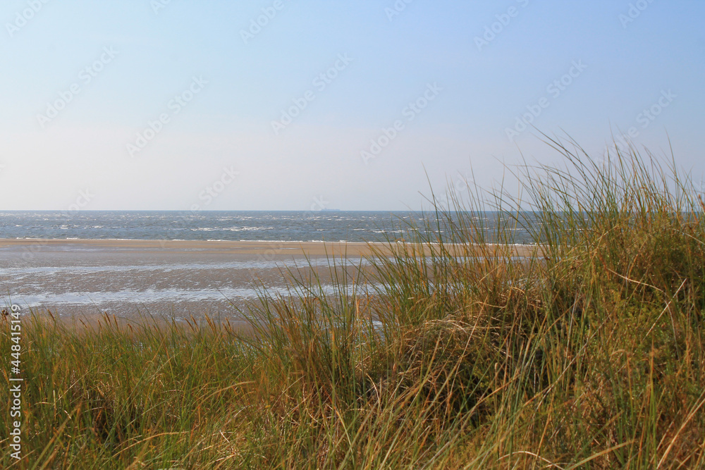 Sand dunes and North Sea in Spiekeroog Sand dunes and North Sea in Spiekeroog