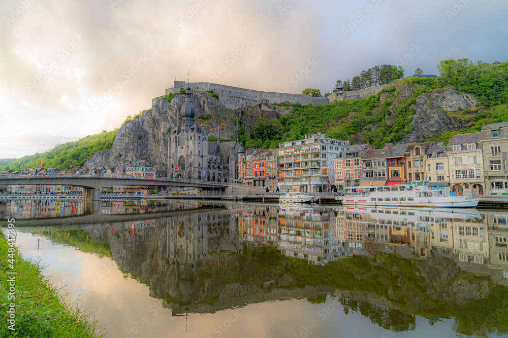 Toeristic pictures of the city Dinant togheter with the River Meuse or Maas.  Beautifull clouds, sunsets or blue hours with reflections on the water.  Belgium Ardennes toeristic topshots.