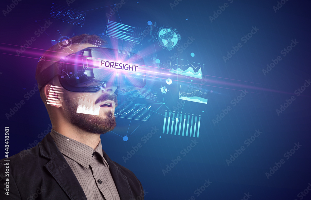 Businessman looking through Virtual Reality glasses Businessman looking through Virtual Reality glasses